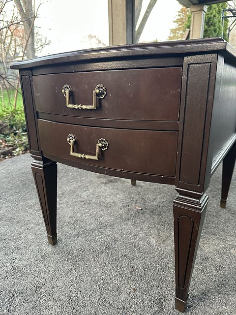 Close-up of the worn drawers before restoration